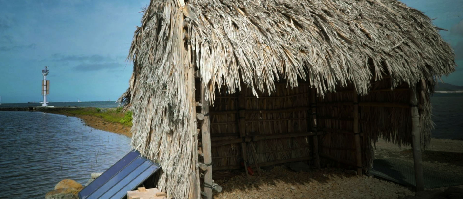 Why Innovation in Hawai‘i? image of Hale and Hawaiian Fish Pond with solar panels