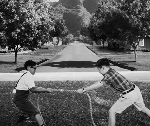 Rivalry - still of two boys in the early 1950's playing tug of war in a Hawaii neighborhood - taken from an advertising campaign produced by Hyperspective